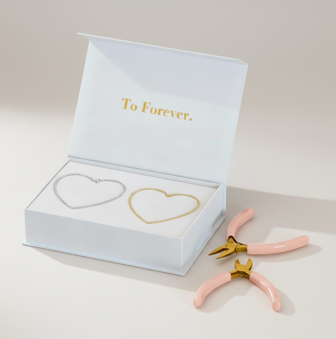 Coffret de bracelets permanents bicolores or et argent, cadeau idéal pour couple ou amies.